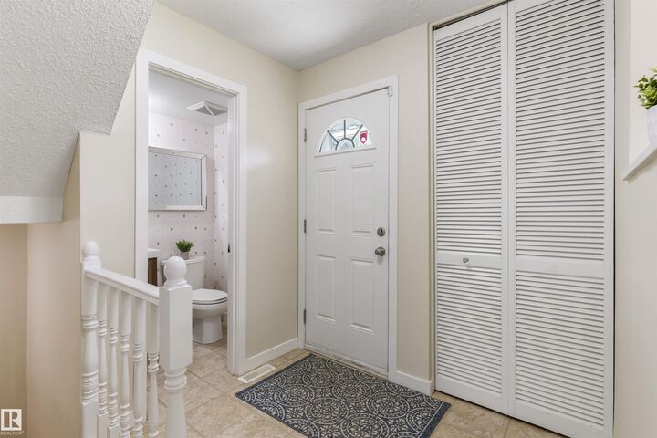 Property Photo:  33 Grandin Village  AB T8N 1R9 