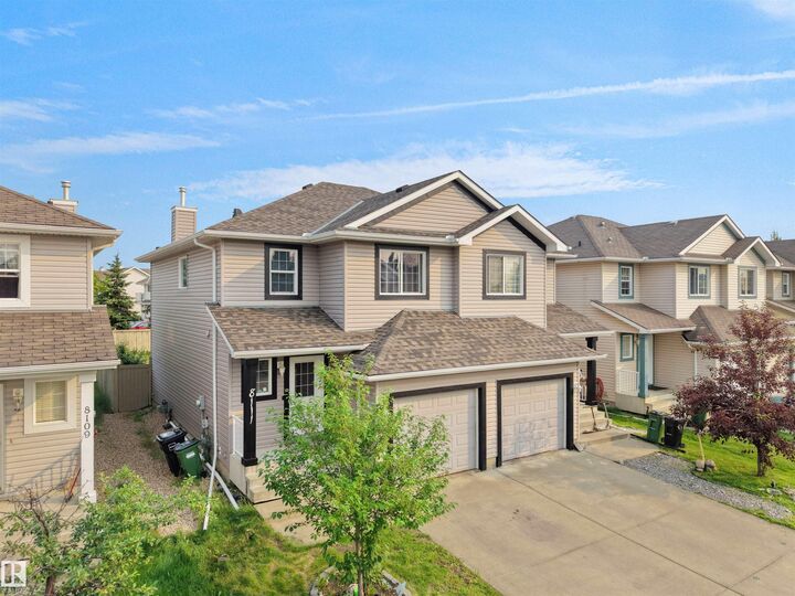 Property Photo:  8111 7 Avenue SW  AB T6X 1L9 