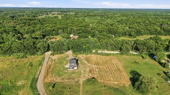 Property Photo:  11427 Heintzelman Road NE  MI 49341 