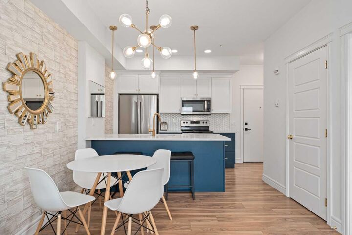 Property Photo:  19661 40 Street SE 216  AB T3M 3H3 