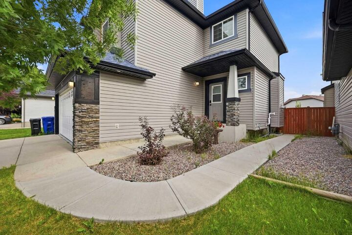 Property Photo: 793 Luxstone Landing SW AB T4B 3K9