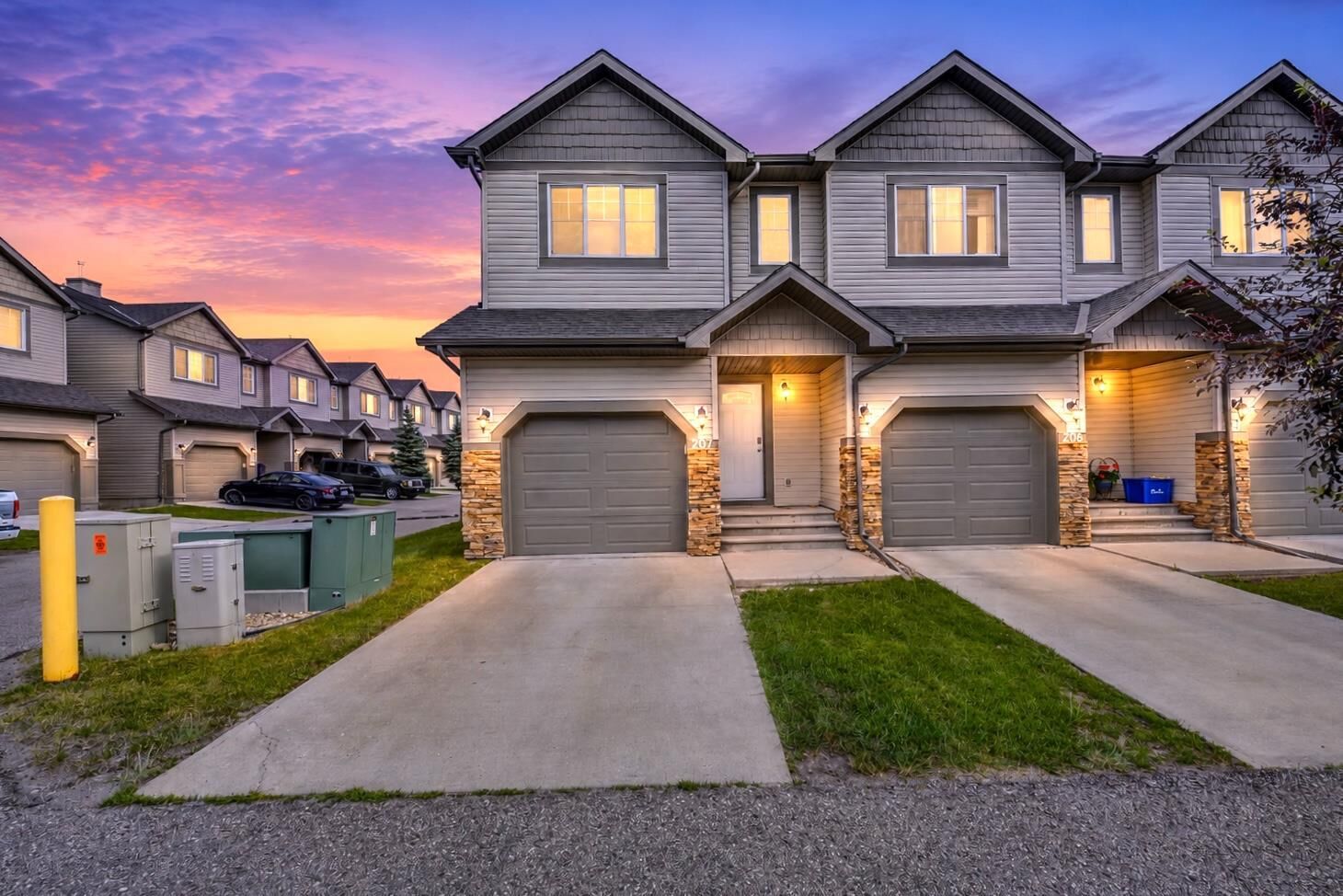 Property Photo: 620 Luxstone Landing SW 207 AB T4B 0B5