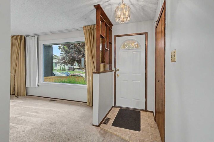 Property Photo: 163 Lake Sylvan Close SE AB T3J 3E5