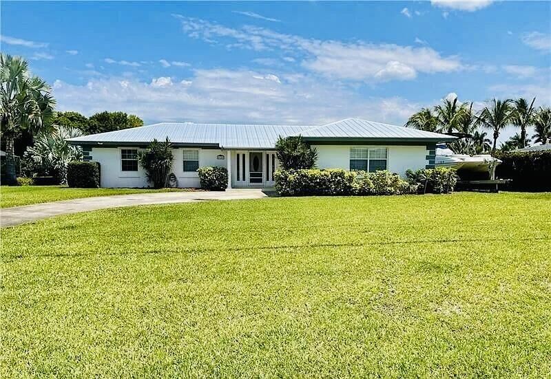 Property Photo: 416 SE Naranja Avenue FL 34983