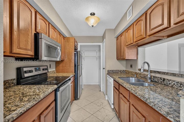 Property Photo:  995 Riverside Dr 120  FL 33071 