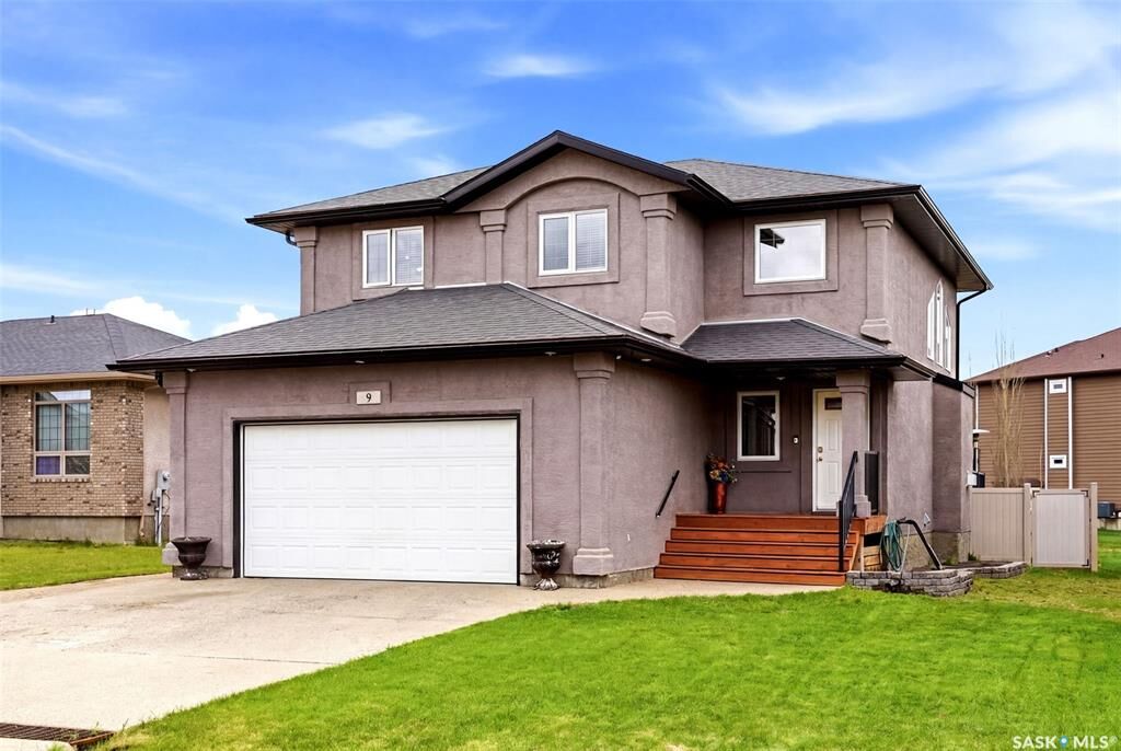 Property Photo: 9 McKenzie Pointe SK S4L 0B2