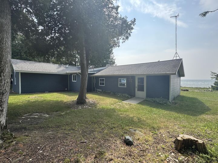 Property Photo:  3798 St Martins Point Road  MI 49745 