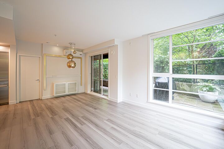Property Photo: 733 W 3rd Street 105 BC V7M 0C8