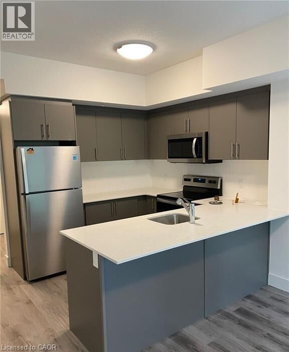 Property Photo: 1201 Lackner Place 307 ON N2A 0L4