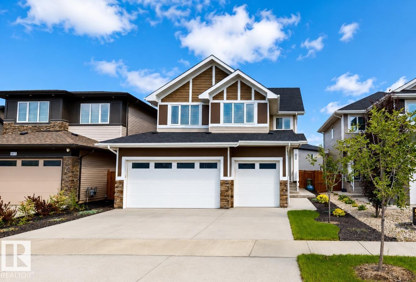 Property Photo: 5813 Pelerin Crescent AB T4X 2X8