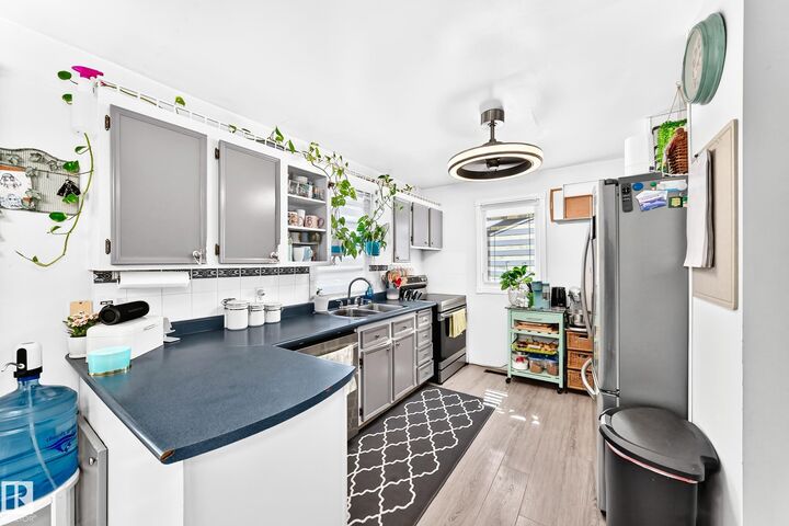 Property Photo: 9911 163 Street NW AB T5P 3N3