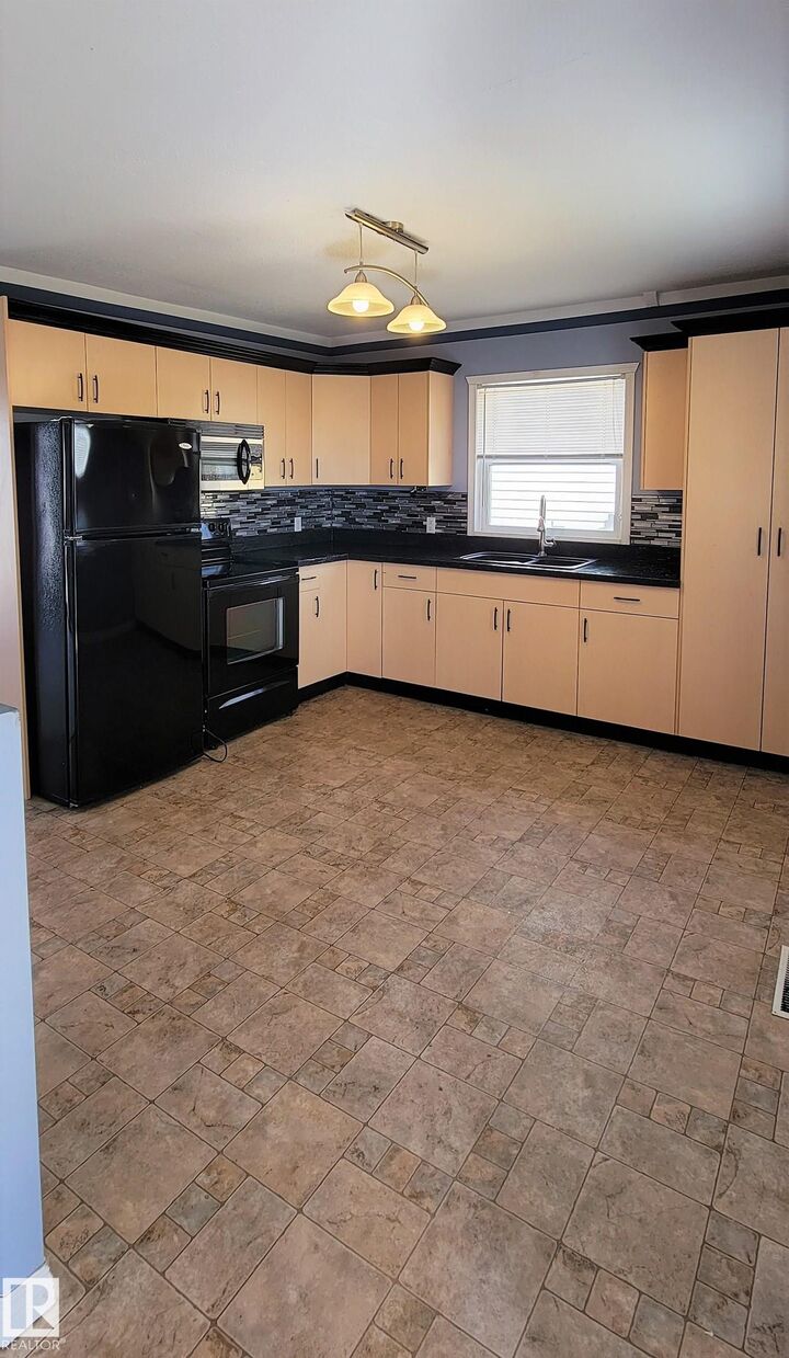 Property Photo: 5422 51 Avenue AB T9N 1Z8