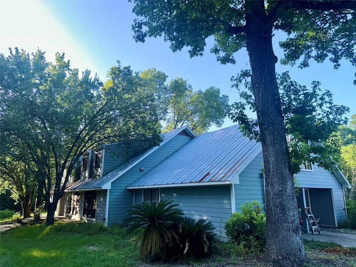 Property Photo:  14750 Exxon Road  TX 77302 