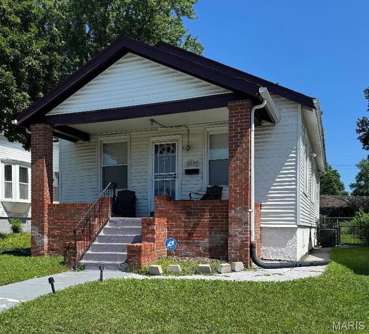 Property Photo:  1039 Wall Street  MO 63147 