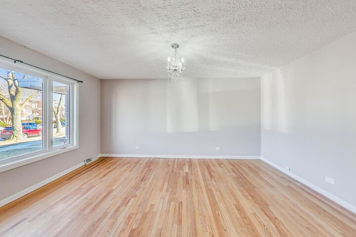 Property Photo:  4839 Crain Street  IL 60077 