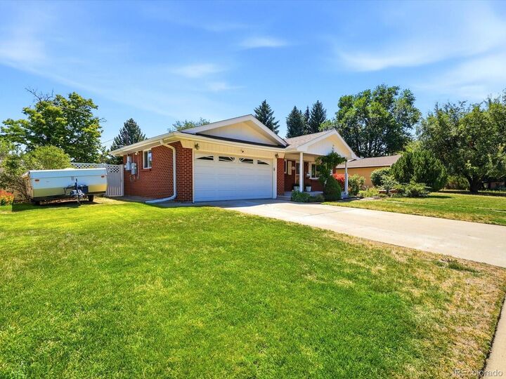 Property Photo:  6022 Nelson Street  CO 80004 