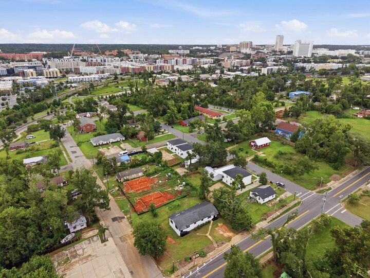 Property Photo: 826 Robert And Trudie Perkins Way 1&2 FL 32310