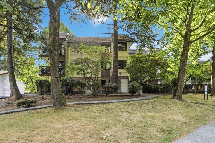Property Photo: 7426 138 Street 211 BC V3W 8G4