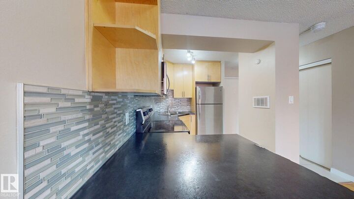 Property Photo: 10140 120 Street NW 307 AB T5K 1Z8