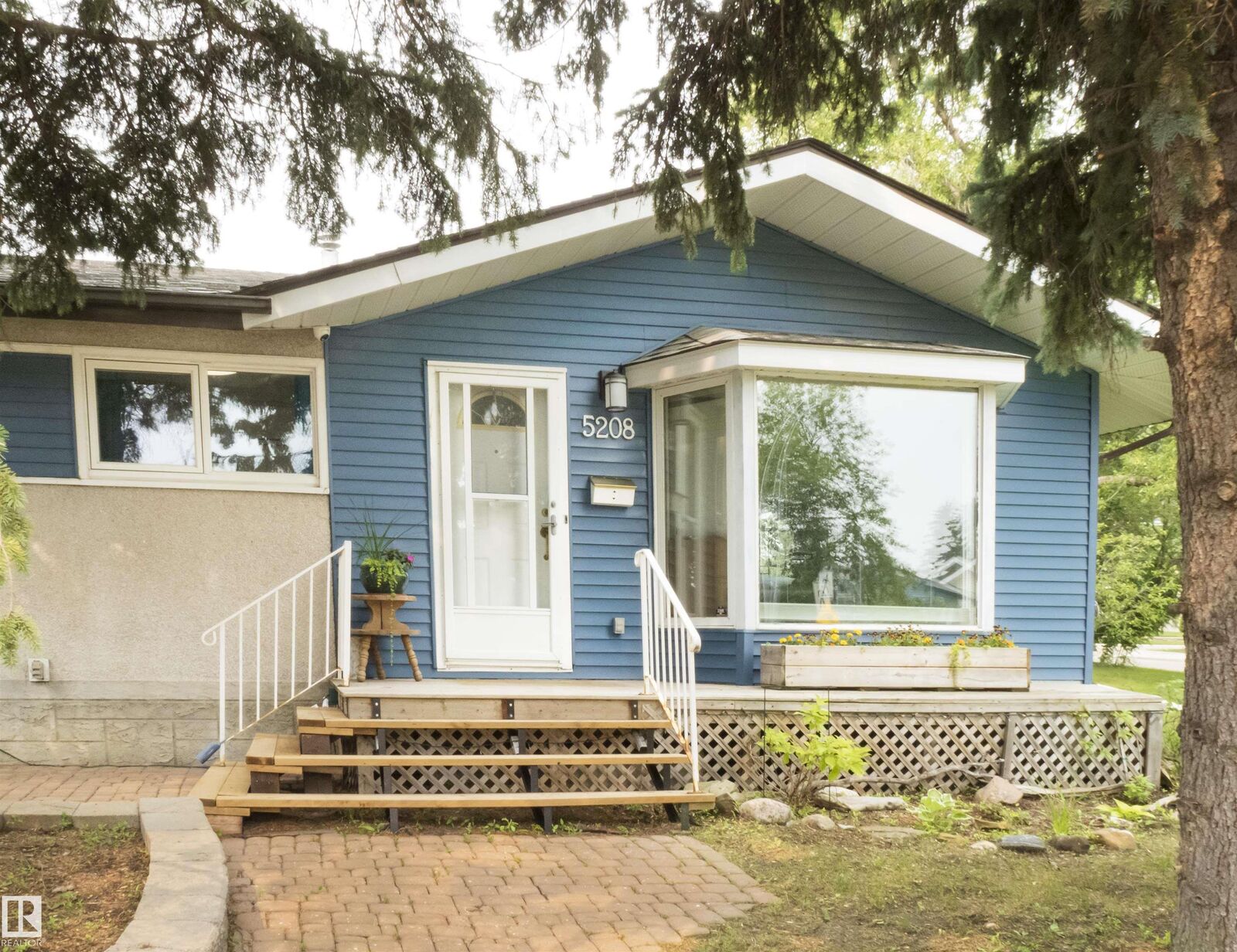 Property Photo:  5208 105 Street NW  AB T6H 2M8 