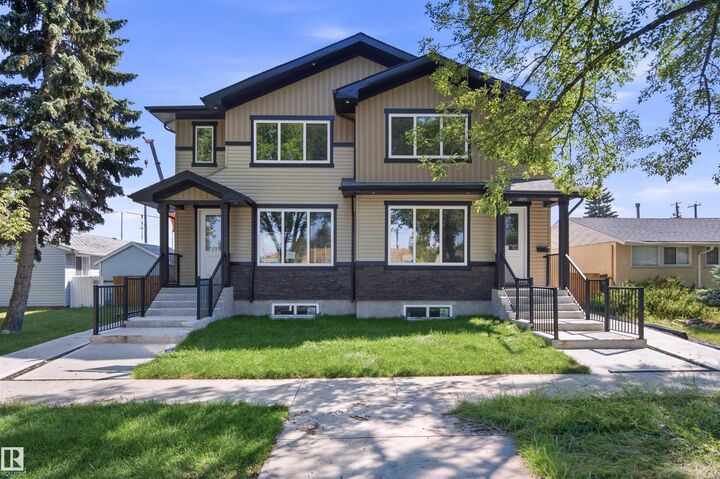 Property Photo:  10707-09 128 Avenue NW  AB T5E 0J4 