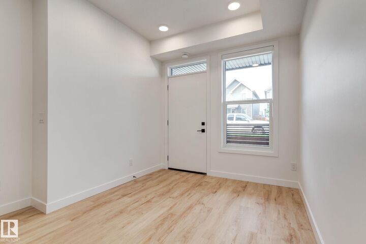 Property Photo: 16231 19 Avenue SW 1 AB T6W 5C6