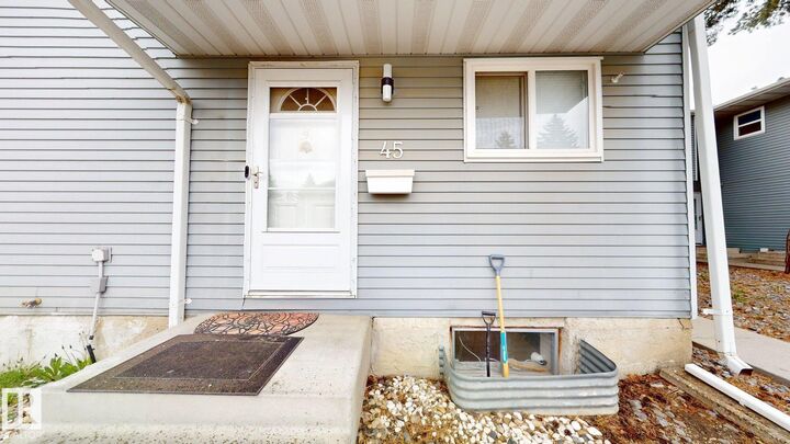 Property Photo: 4403 Riverbend Road NW AB T6H 5S9