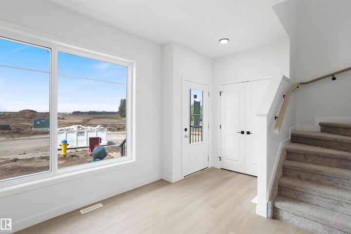Property Photo: 1563 211 Street NW AB T6M 3P1