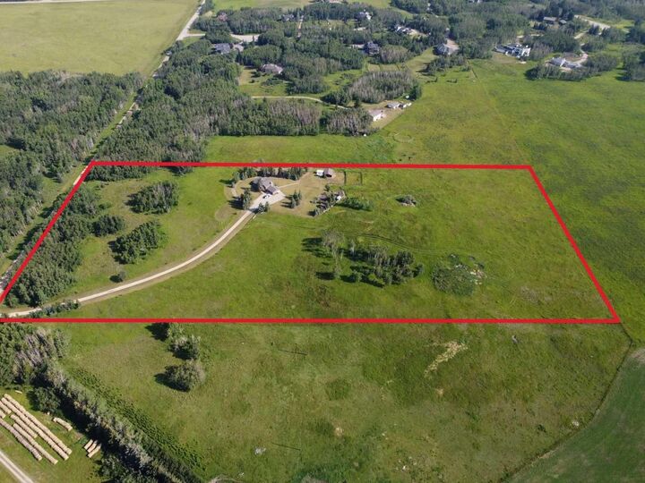 Property Photo:  261136 Range Road 33  AB T4C 0G6 