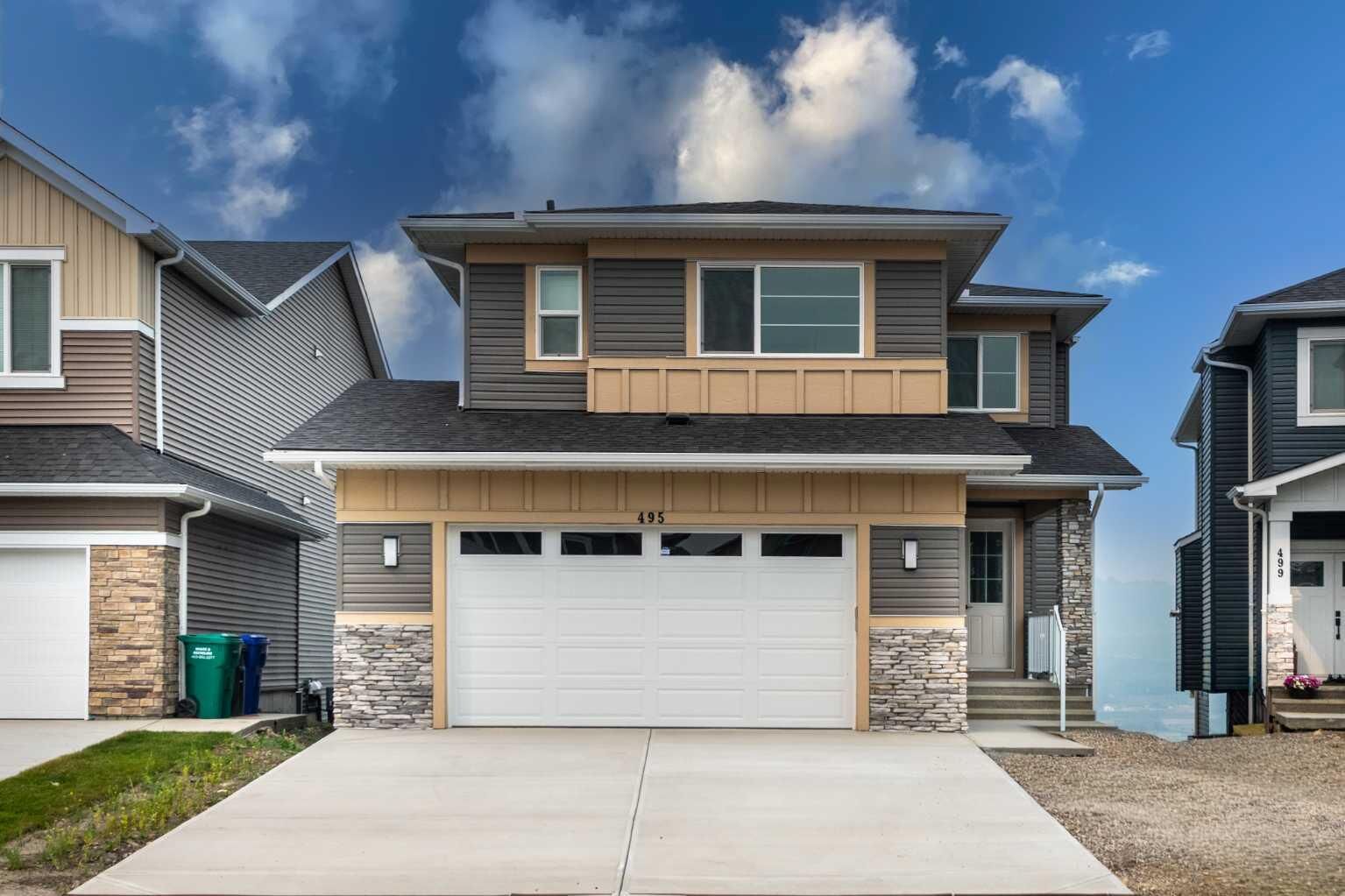 Property Photo: 495 Rivercrest View AB T4C 2W9