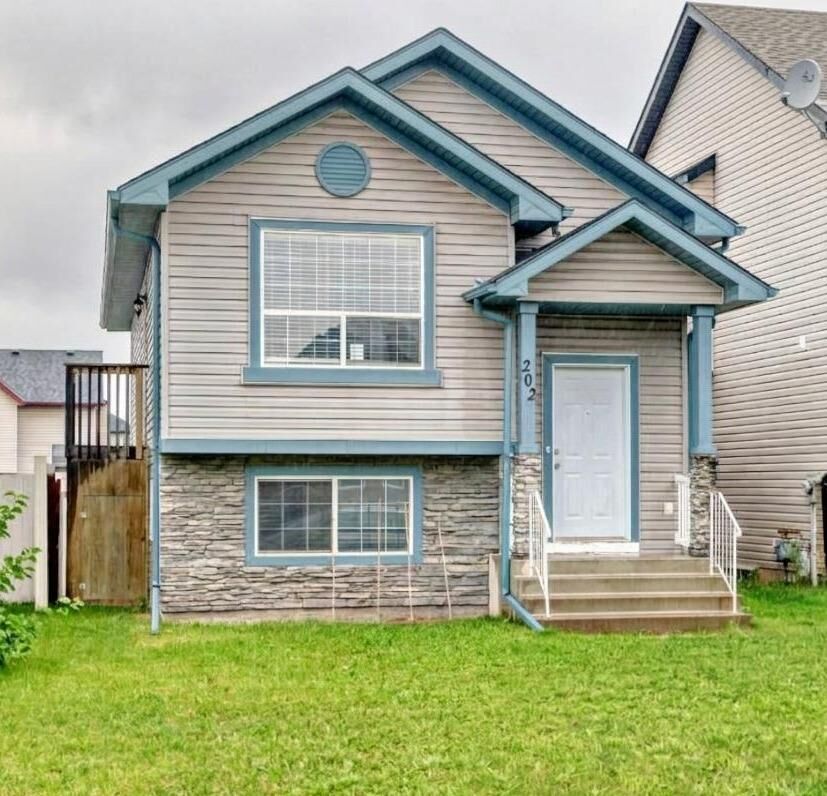 Property Photo: 202 Saddlemead Green NE AB T3J 4M7