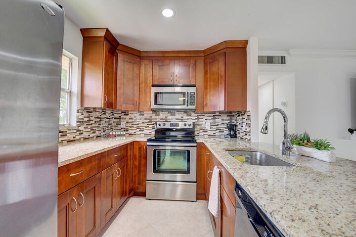Property Photo:  468 Saxony J  FL 33446 