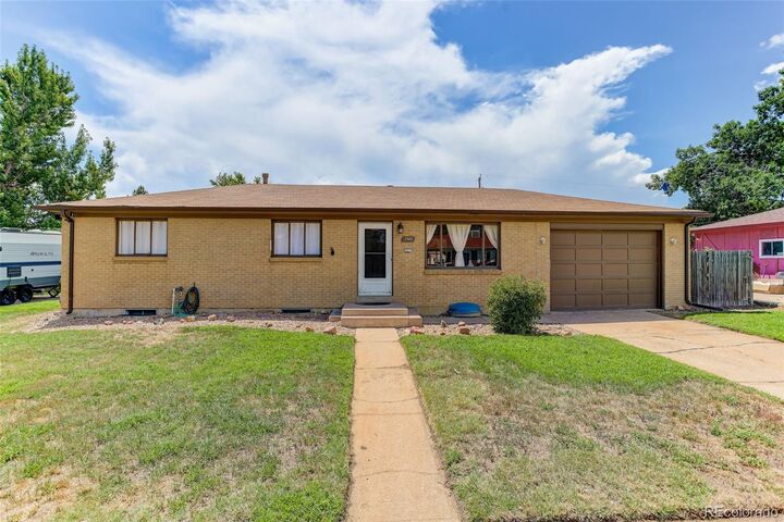 Property Photo:  2940 W Saratoga Avenue  CO 80110 