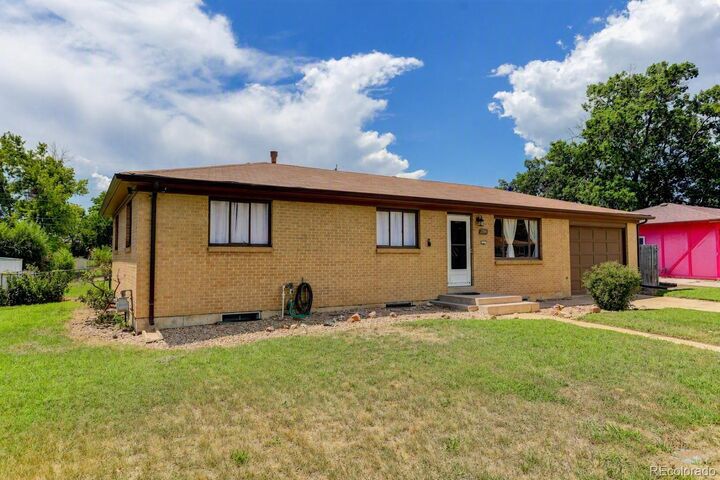 Property Photo:  2940 W Saratoga Avenue  CO 80110 
