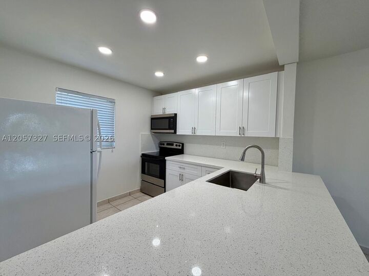 Property Photo:  7730 Camino Real F 406  FL 33143 