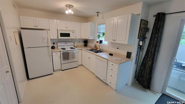Property Photo: 203 Herold Terrace 86 SK S7V 1H6