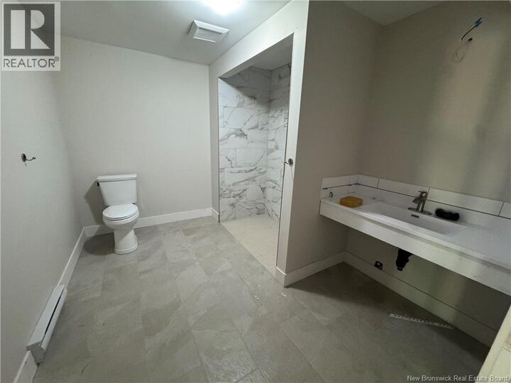 Property Photo:  268 Main Street Unit# 104  NB E5N 6B8 