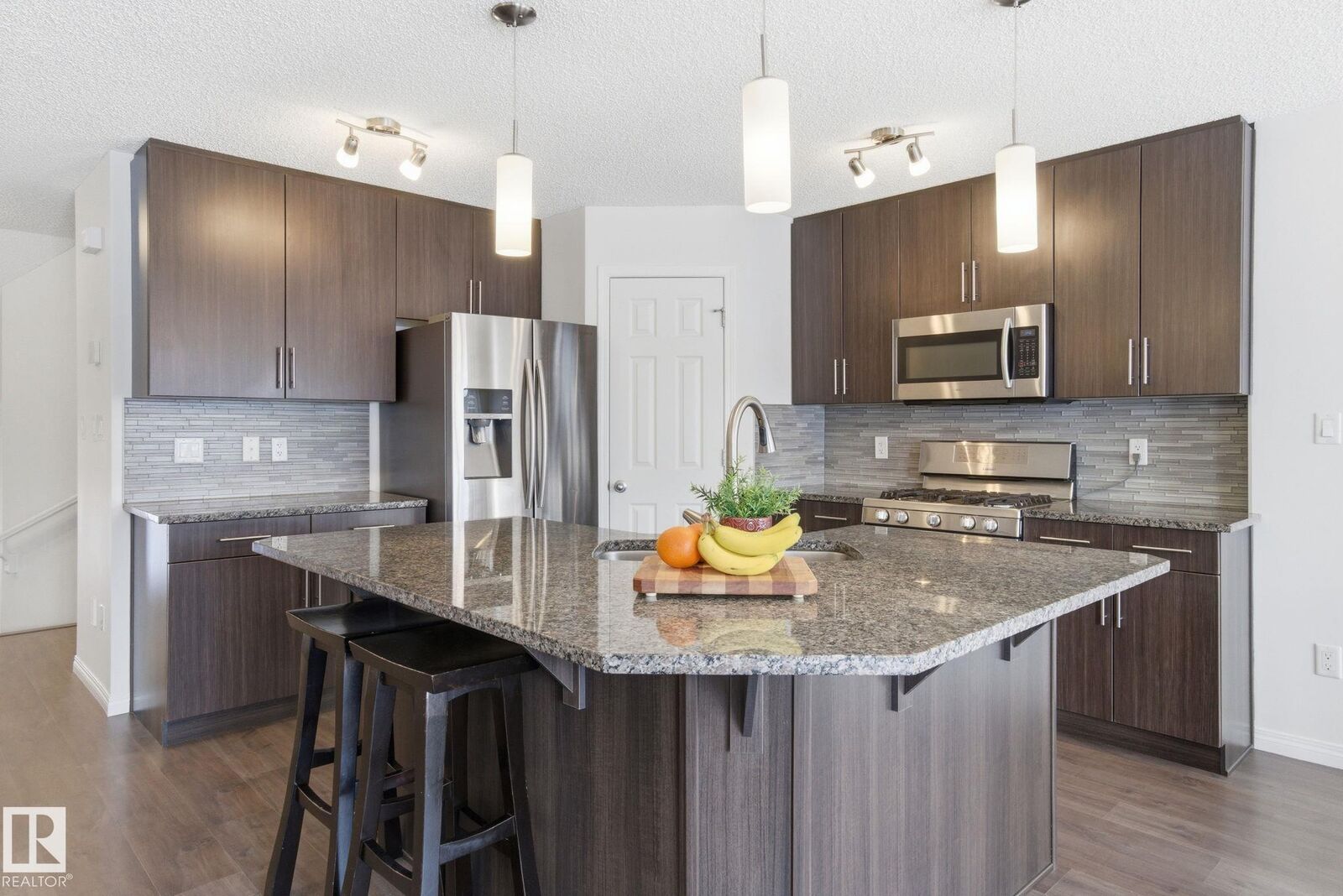 Property Photo:  2553 Coughlan Road SW  AB T6W 2Z6 