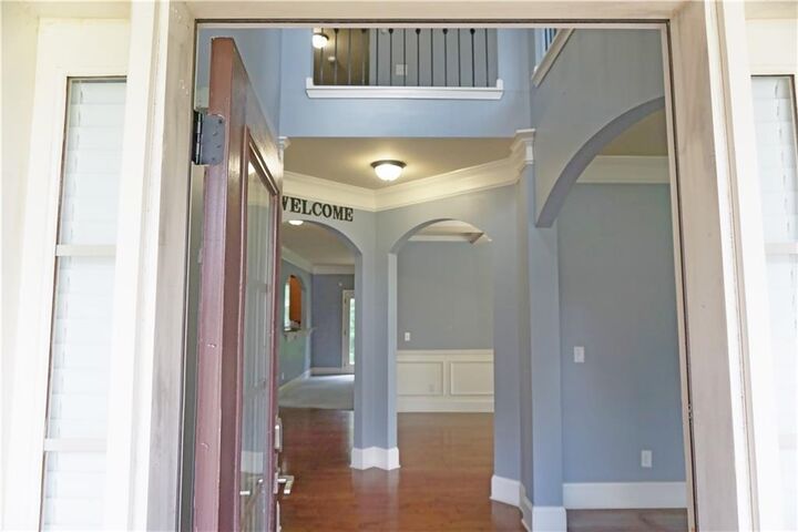 Property Photo: 5669 Woodland Greens Road GA 30135