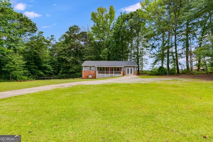 Property Photo:  2961 W Hwy 166  GA 30117 