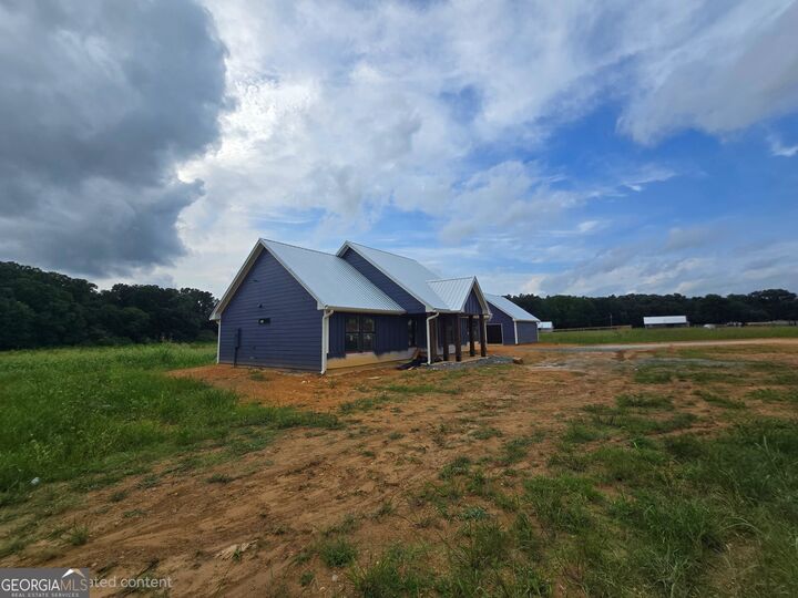 Property Photo:  3300 Collard Valley Road  GA 30125 