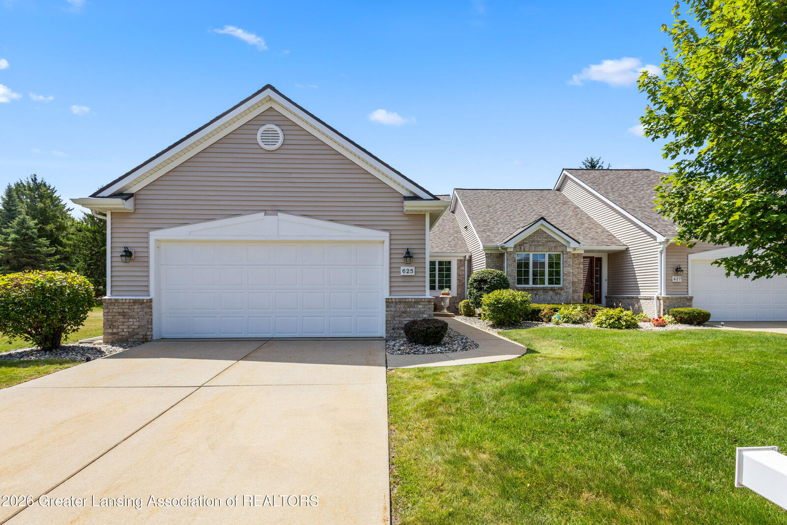 Property Photo:  625 Burgenstock Drive  MI 48917 