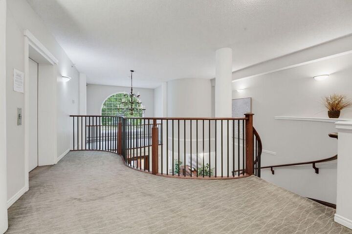 Property Photo: 4835 Dalhousie Drive NW 205 AB T3A 5R7