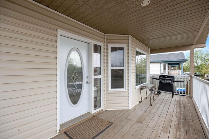 Property Photo:  209 Ash Way  AB T9K 0E9 