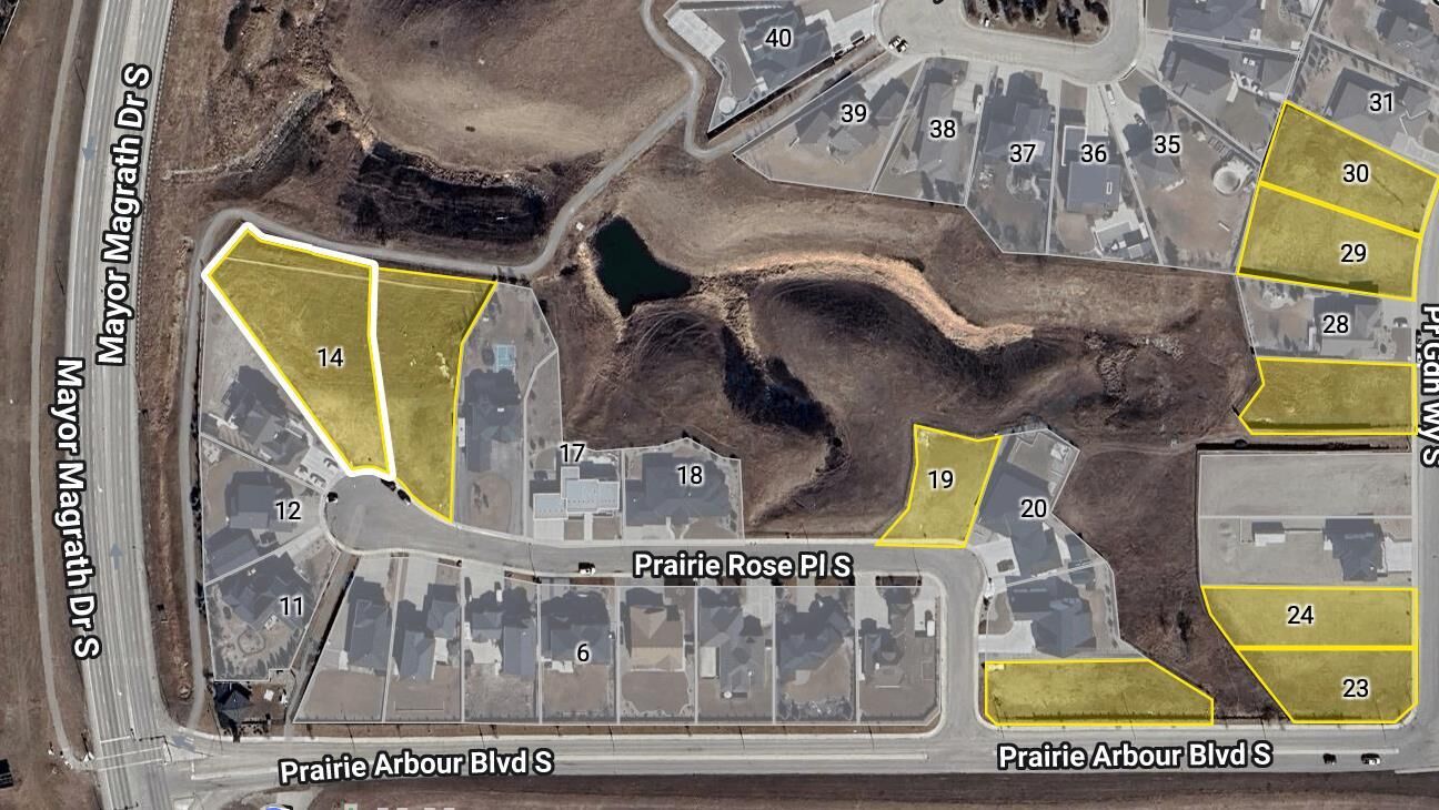 Property Photo: 241 Prairie Rose Place S AB T1K 5V7