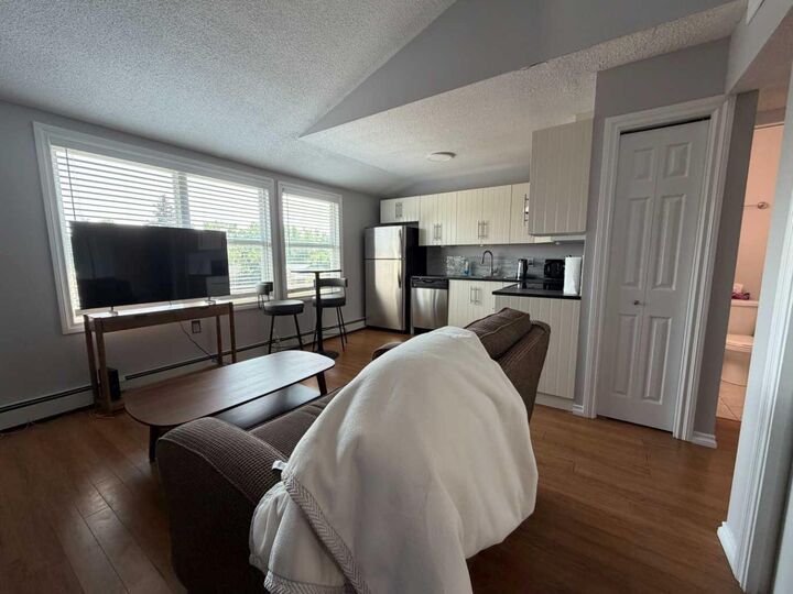 Property Photo:  7201 Poplar 4205  AB T8V 6C5 