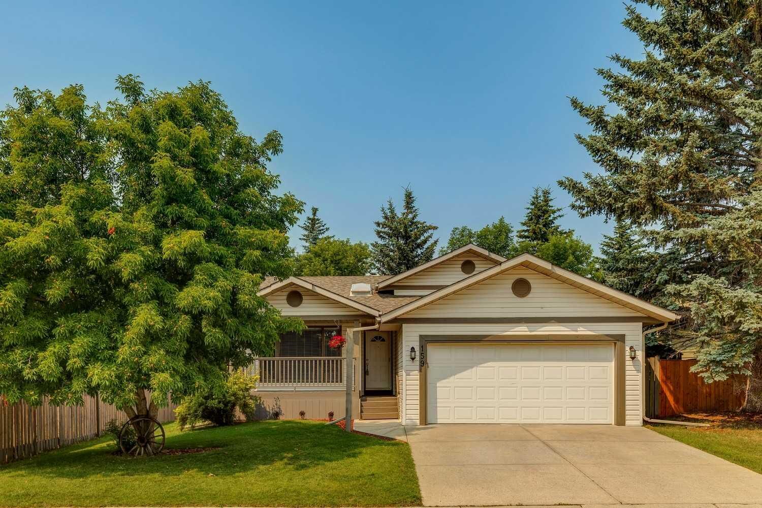 Property Photo: 159 Woodbend Way AB T1S 1M7