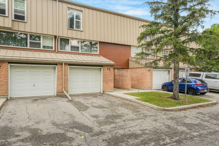 Property Photo:  70 Brae Glen Lane SW  AB T2W 1B6 