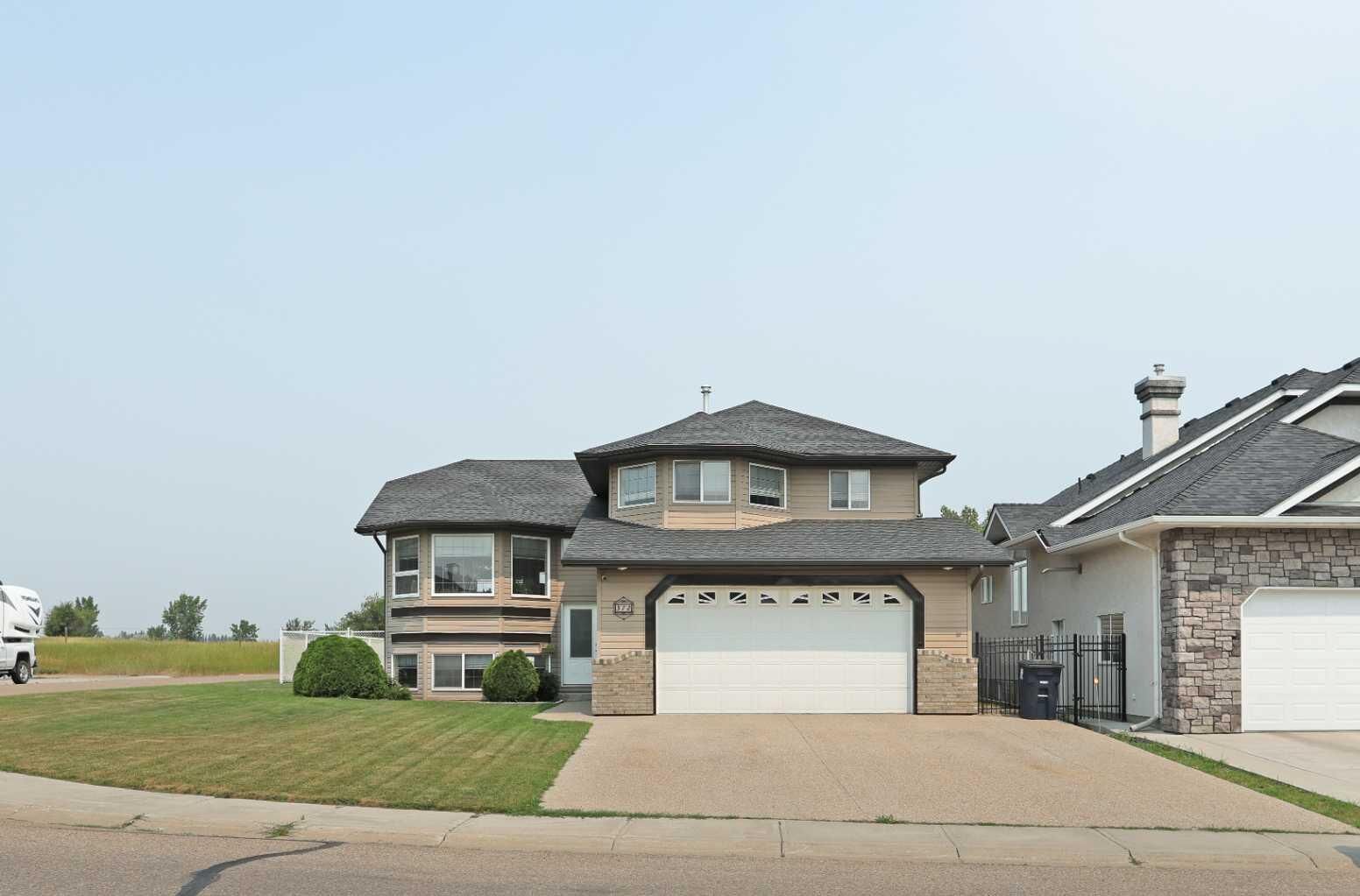 Property Photo: 372 Lake Stafford Drive E AB T1R 1P8