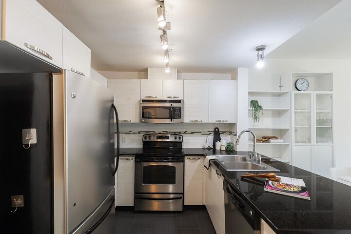Property Photo: 7418 Byrnepark Walk 314 BC V3N 0B3